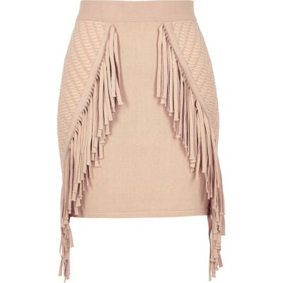 Light pink knitted fringed mini skirt